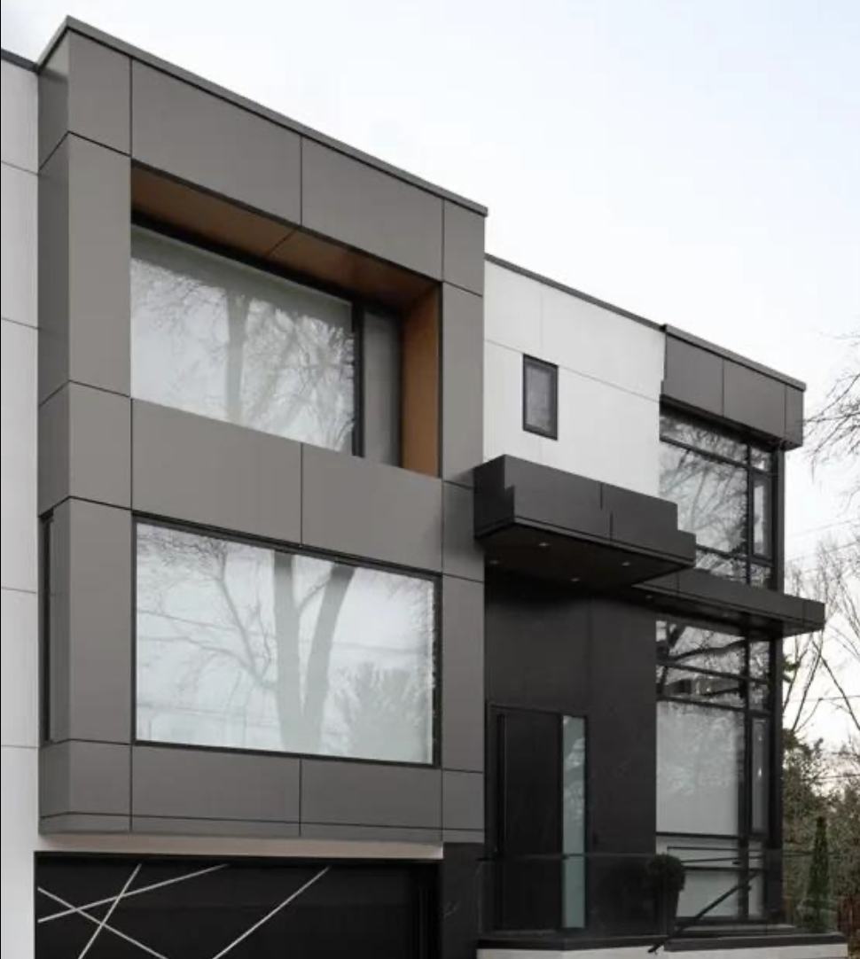 Modern architectural facade with cladding and large windows on a Berm Inc. project