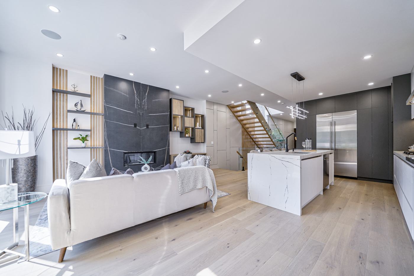 Open-concept living room and kitchen — Berm Inc. project photo